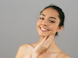 tanned skin happy smile woman face